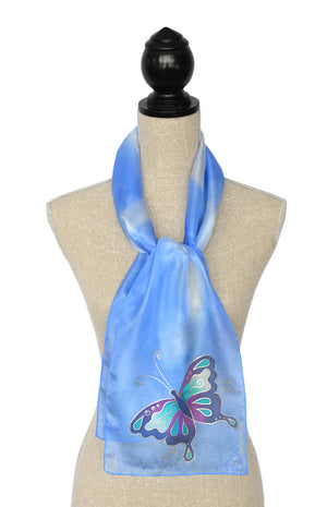 Silk scarf with butterfly design shown on mannequin