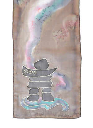 Silk scarf with inuksuk design shown in taupe