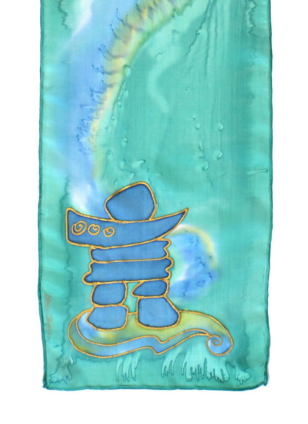 Silk scarf with inuksuk design shown in mint green