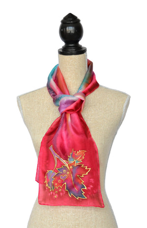 Canadian maple leaf hand-painted silk scarf in rich red shown on mannequin