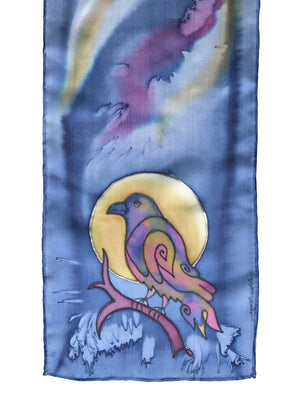 Silk scarf with raven design shown in lavender