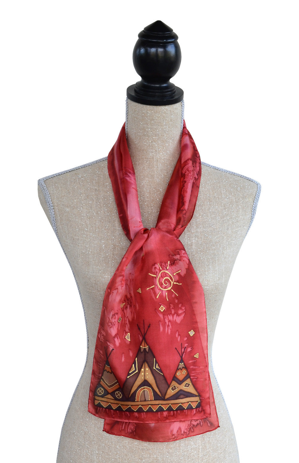 Hand-painted silk tipi scarf in red shown on mannequin